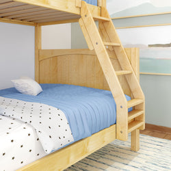 Wooden bunk bed with a blue mattress and star-patterned bedding in a cozy bedroom.