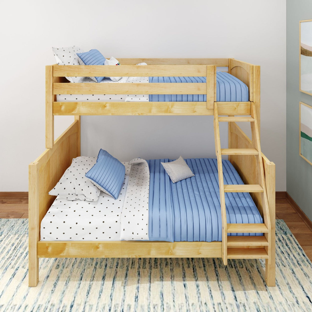 Wooden bunk bed with blue bedding and polka dot pillows in a modern bedroom setting.