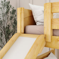 Cozy children's bunk bed with a wooden slide and soft pillows in a modern bedroom setting.