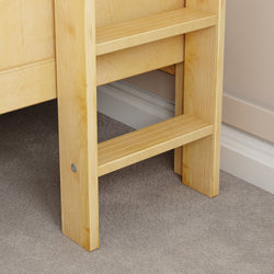 Wooden bunk bed ladder with two steps against a carpeted floor in a bedroom setting.