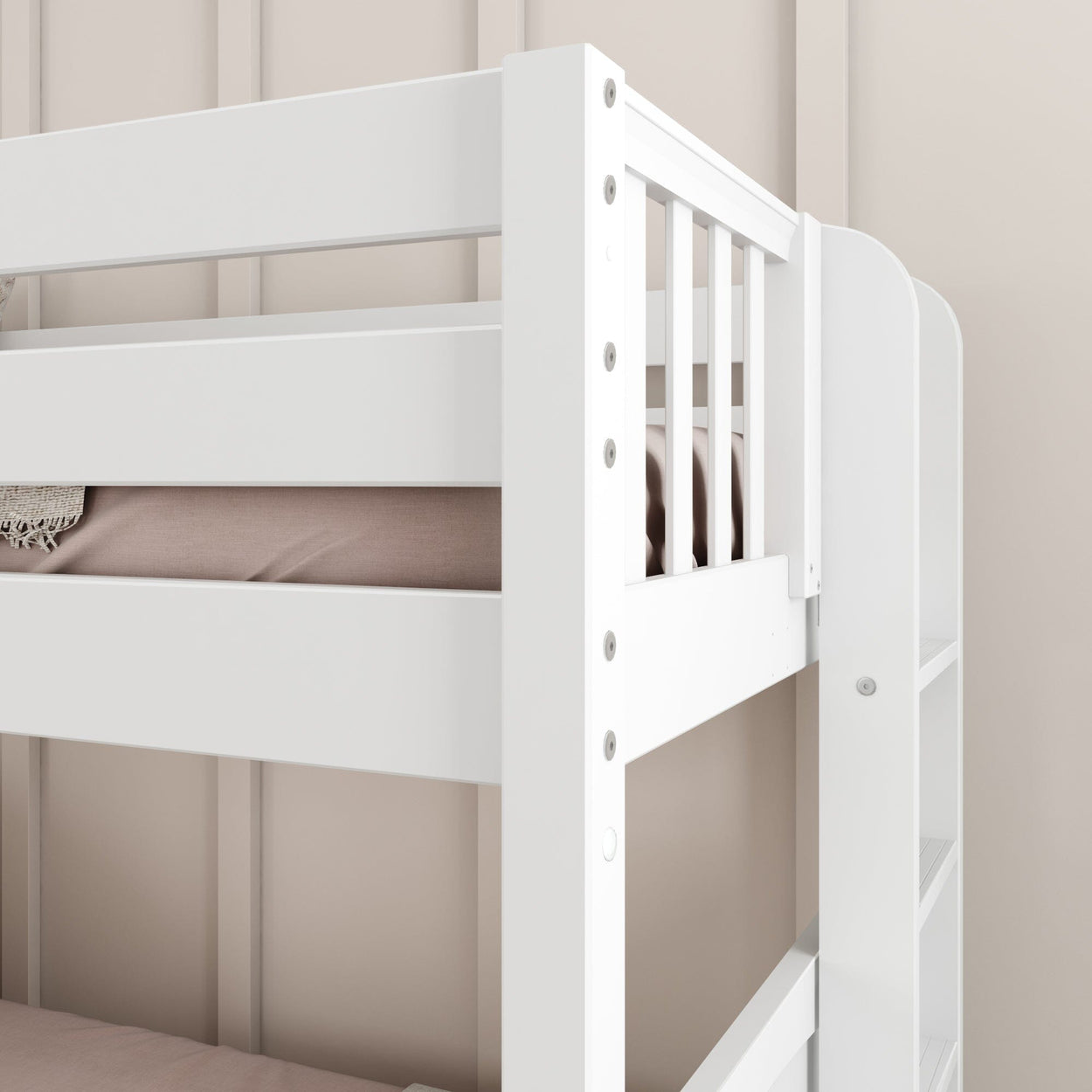 White wooden bunk bed with built-in shelving and neutral bedding against a light wall.