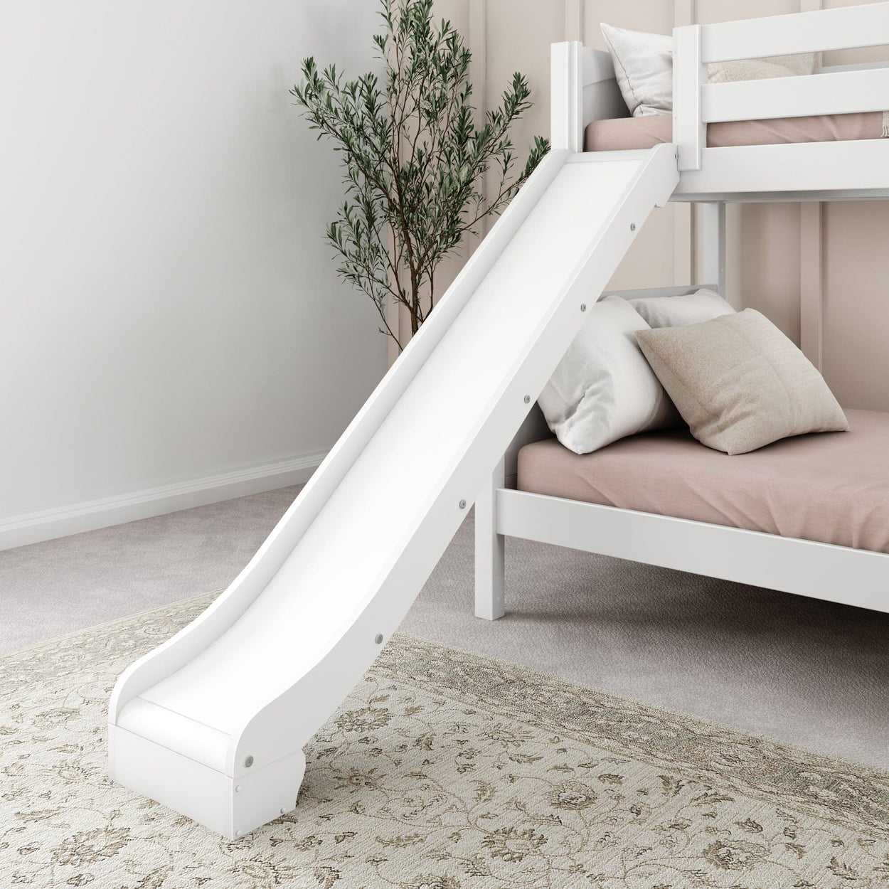 White bunk bed with slide in a cozy room setting, featuring pillows and a decorative plant.