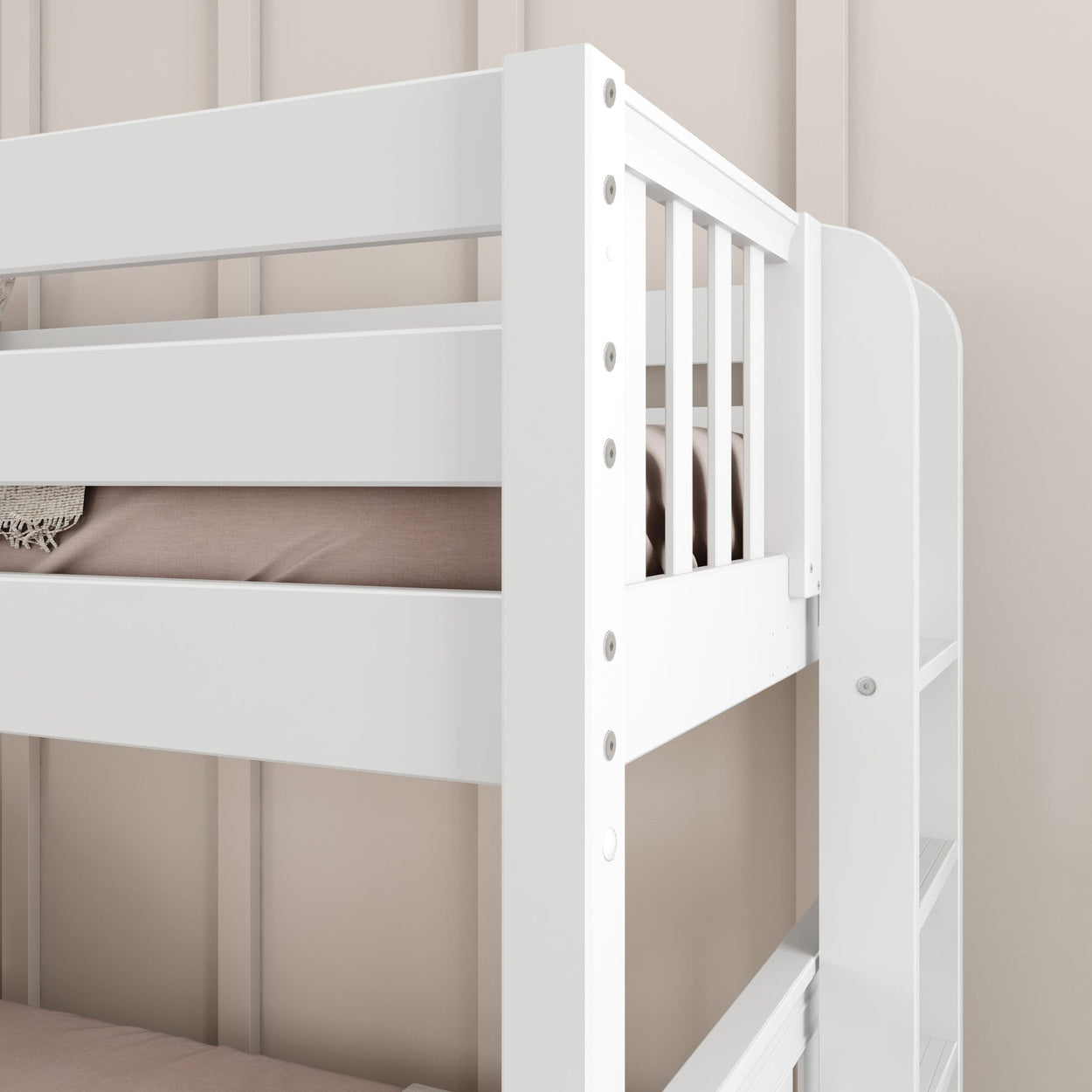White wooden bunk bed with a safety rail and integrated shelf, ideal for children's bedroom furniture.