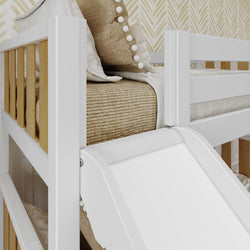 White bunk bed with slide and beige bedding in a children's room.