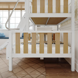 Modern wooden bunk bed design in a bright kid’s bedroom with natural light.