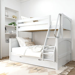 White wooden bunk bed with ladder in a modern bedroom setting featuring cozy bedding and decorative pillows.