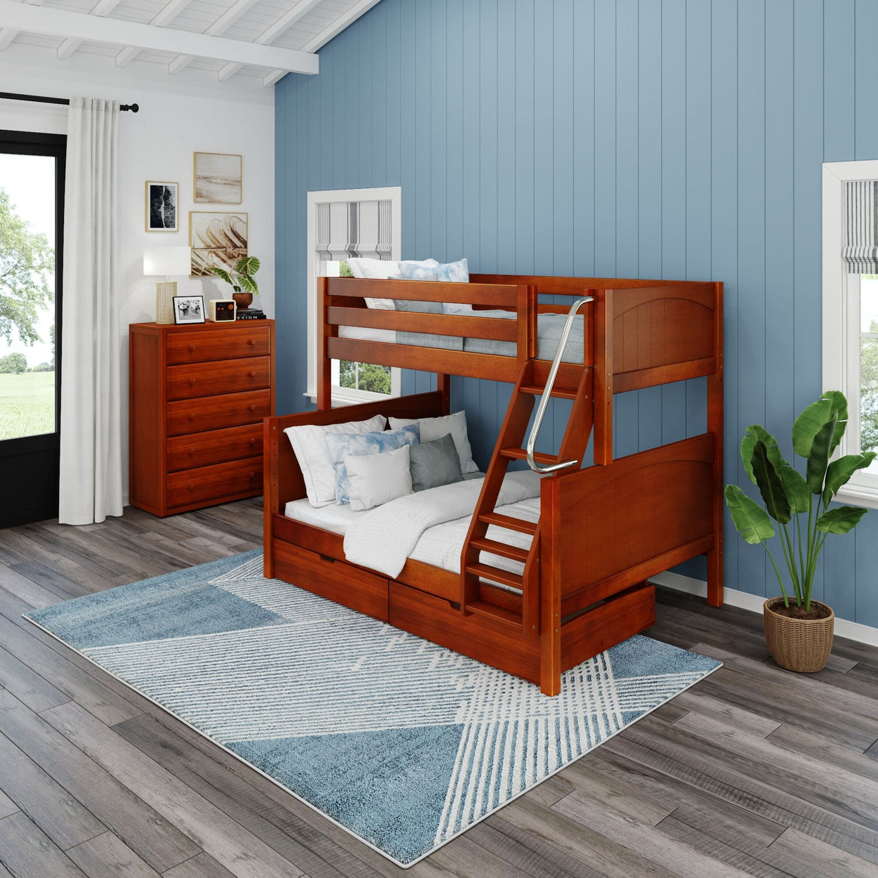 Stylish wooden bunk bed with a pull-out trundle in a cozy blue-themed bedroom featuring modern décor and hardwood flooring.