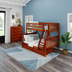 Bunk bed with wooden frame in modern bedroom with blue walls and decorative rug.