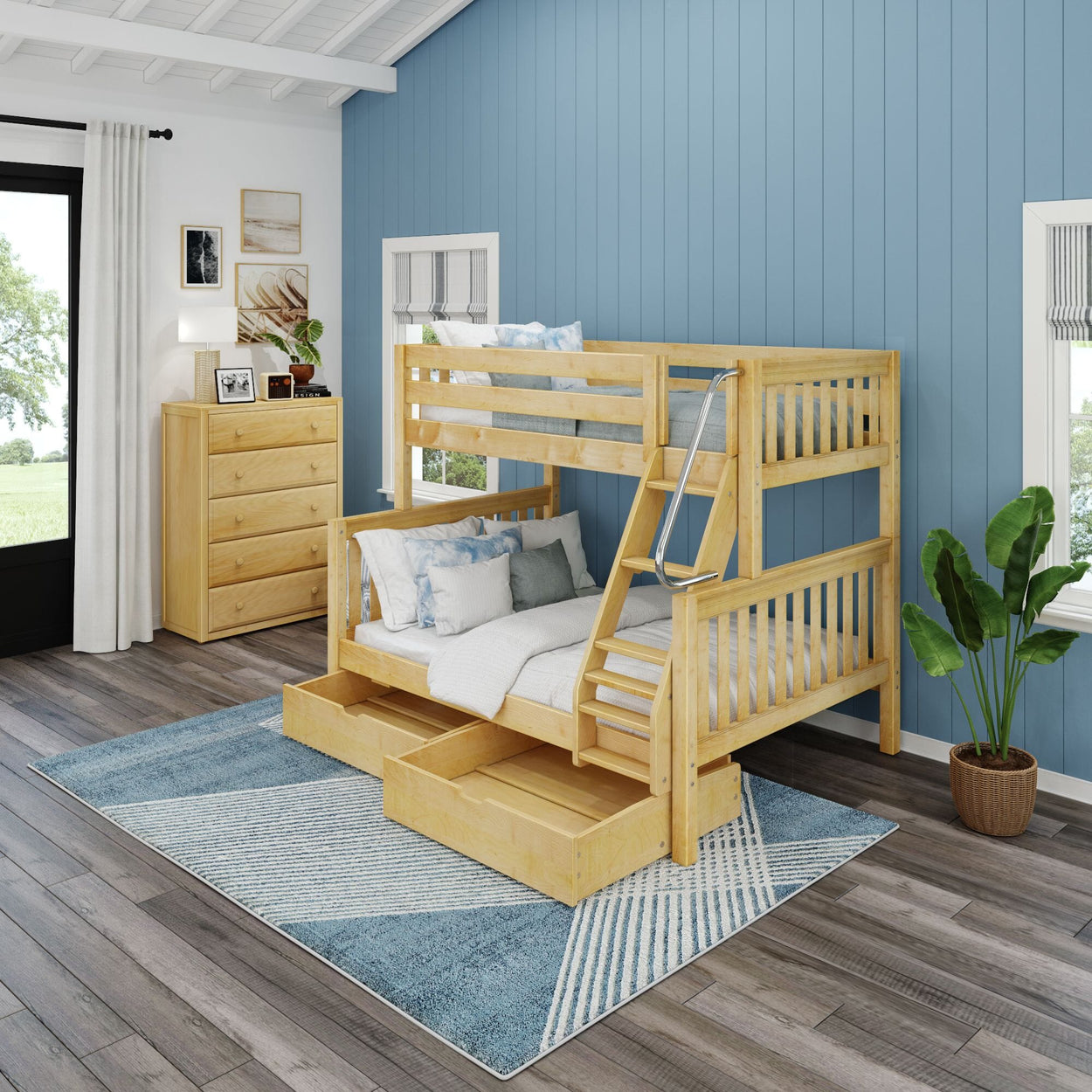Wooden bunk bed with storage drawers in a modern bedroom with blue accent wall.