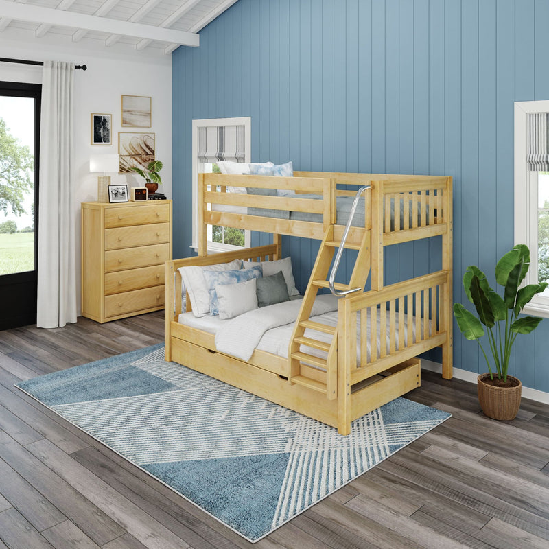 Natural wood twin-over-full bunk bed with ladder, safety rails and trundle drawer in a coastal-style kids' bedroom with blue shiplap wall, wooden dresser, gray-blue geometric area rug, potted plant and hardwood floors