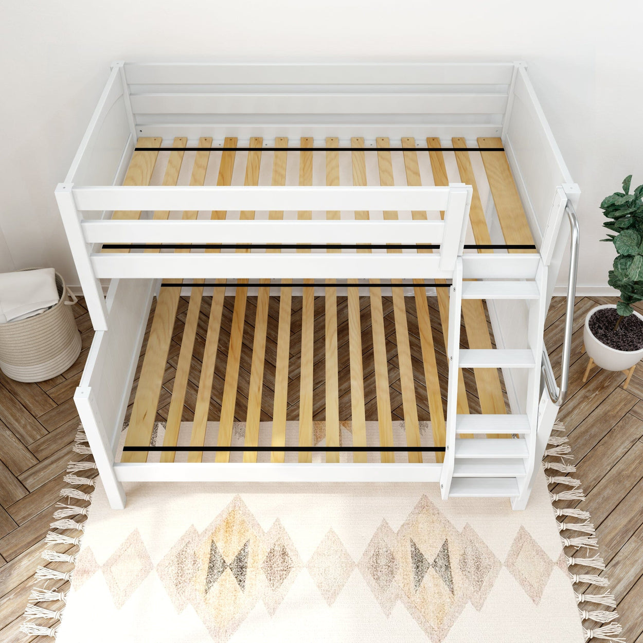 White wooden bunk bed frame with ladder in a modern children's bedroom.