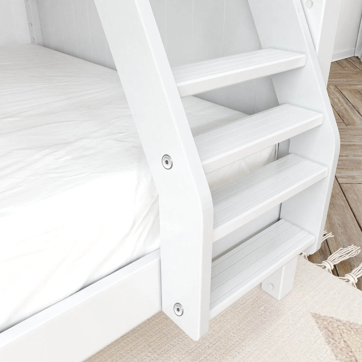 White wooden bunk bed steps and mattress with natural wood flooring background.