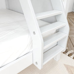 White wooden bunk bed steps and mattress with natural wood flooring background.