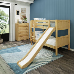 Children's bedroom with wooden bunk bed and slide, blue accent wall, and modern decor.