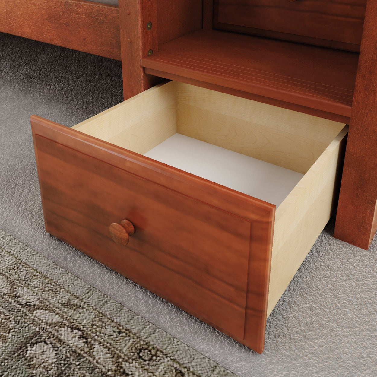 Open wooden drawer under bed for bedroom storage organization.
