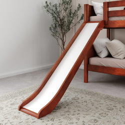 Wooden bunk bed with slide in a cozy bedroom, featuring neutral decor and a patterned rug.
