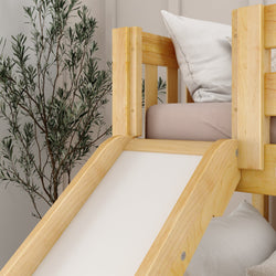 Wooden bunk bed with slide and pillows in modern bedroom interior design.