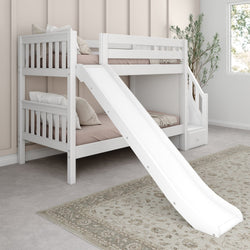 White wooden bunk bed with slide and stairs in a cozy children's bedroom featuring soft pillows and a patterned floor rug.