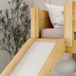 Wooden loft bed with a slide and white pillow in a modern children's room.