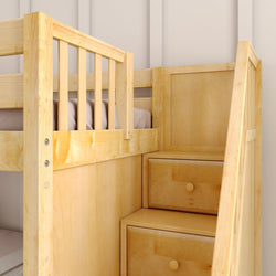 Rustic wooden bunk bed with built-in storage drawers and safety rail in modern bedroom.