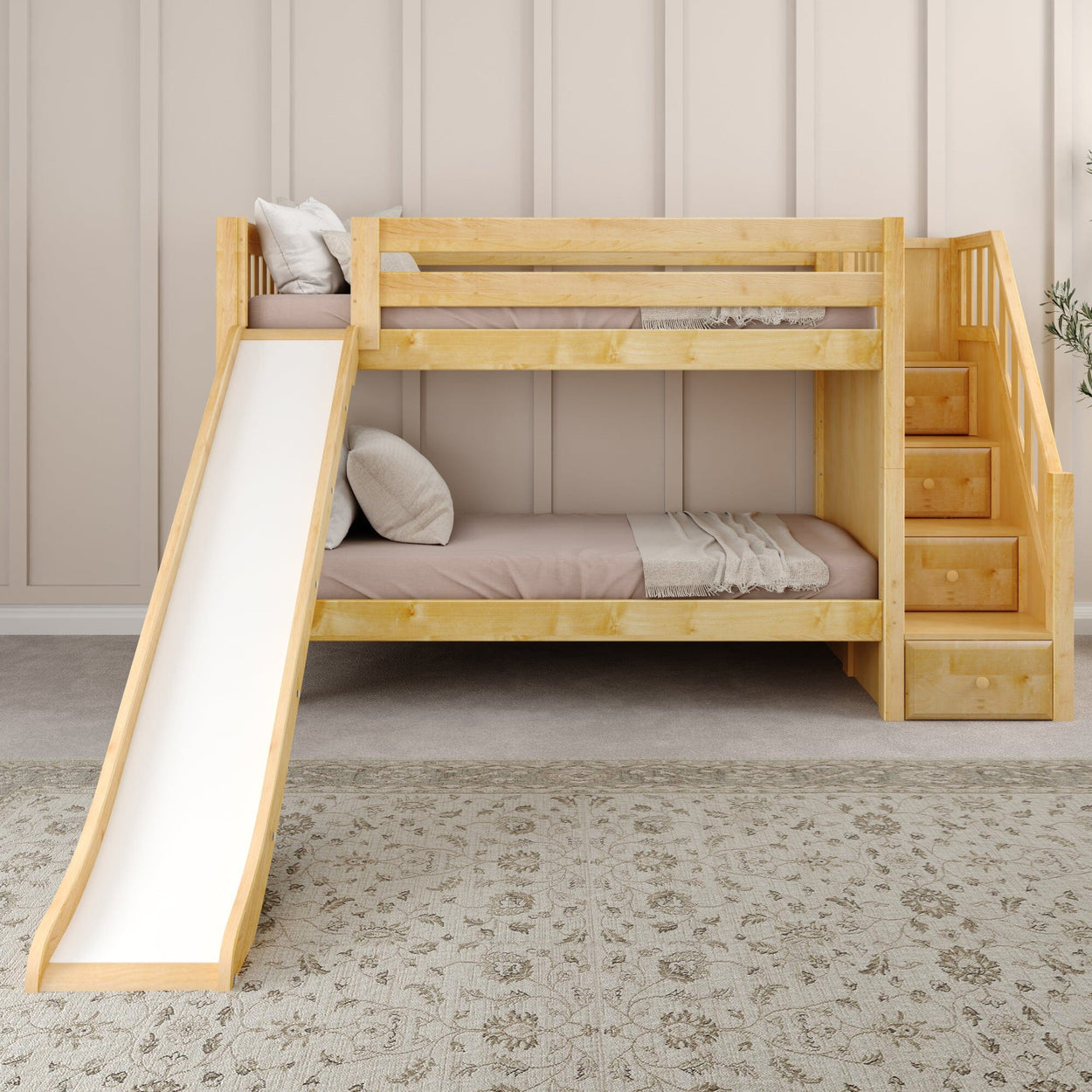 Wooden bunk bed with slide and stairs in cozy bedroom setting.
