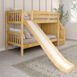 Wooden bunk bed with slide and stairs in a cozy children's bedroom.