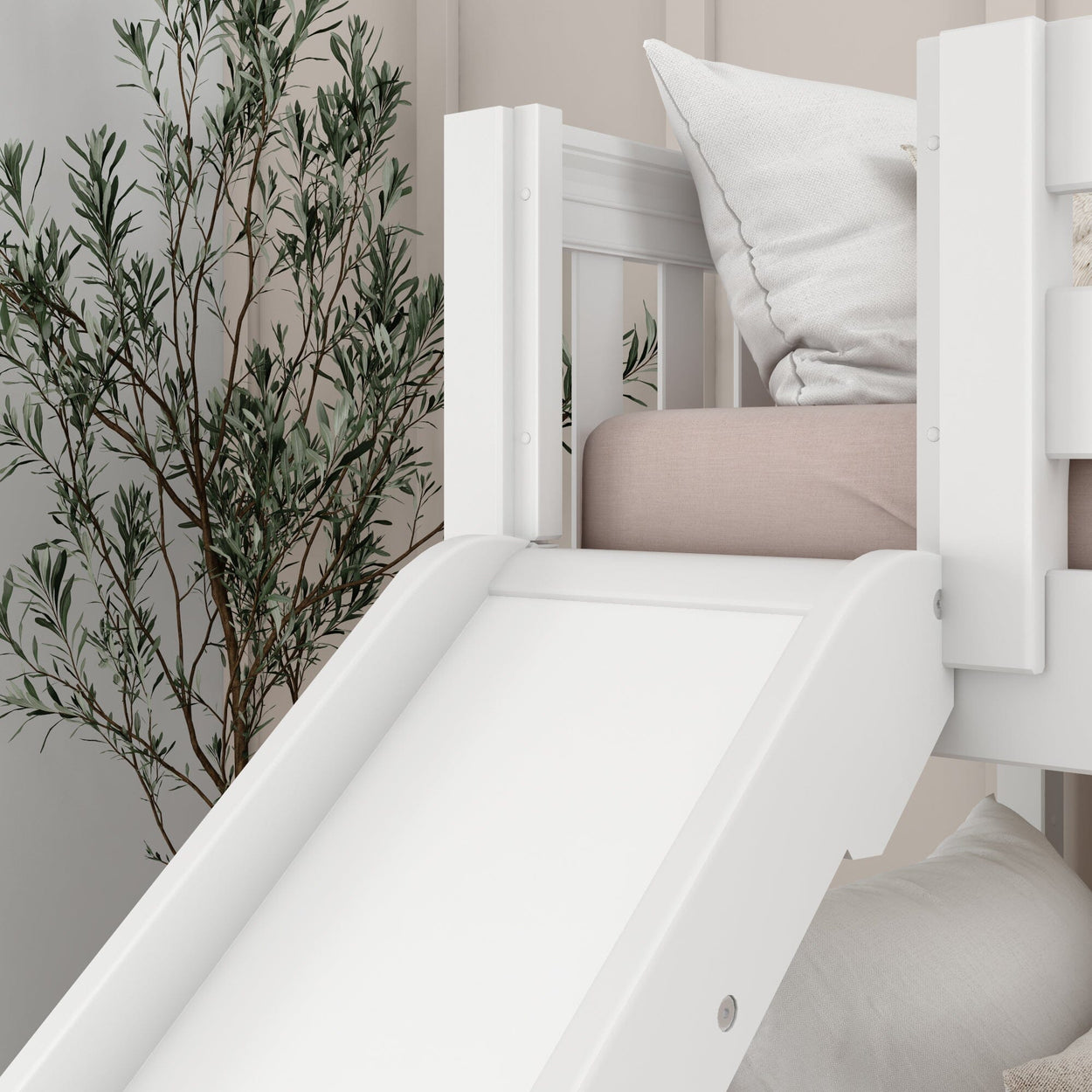 White wooden loft bed with slide and pink bedding next to a potted plant in a modern bedroom.