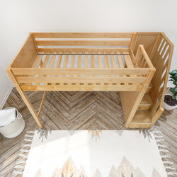 Wooden loft bed with staircase in modern bedroom interior, featuring geometric-patterned rug and plant decor.
