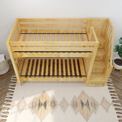 Wooden bunk bed with built-in stairs and storage, perfect for kids' bedrooms.