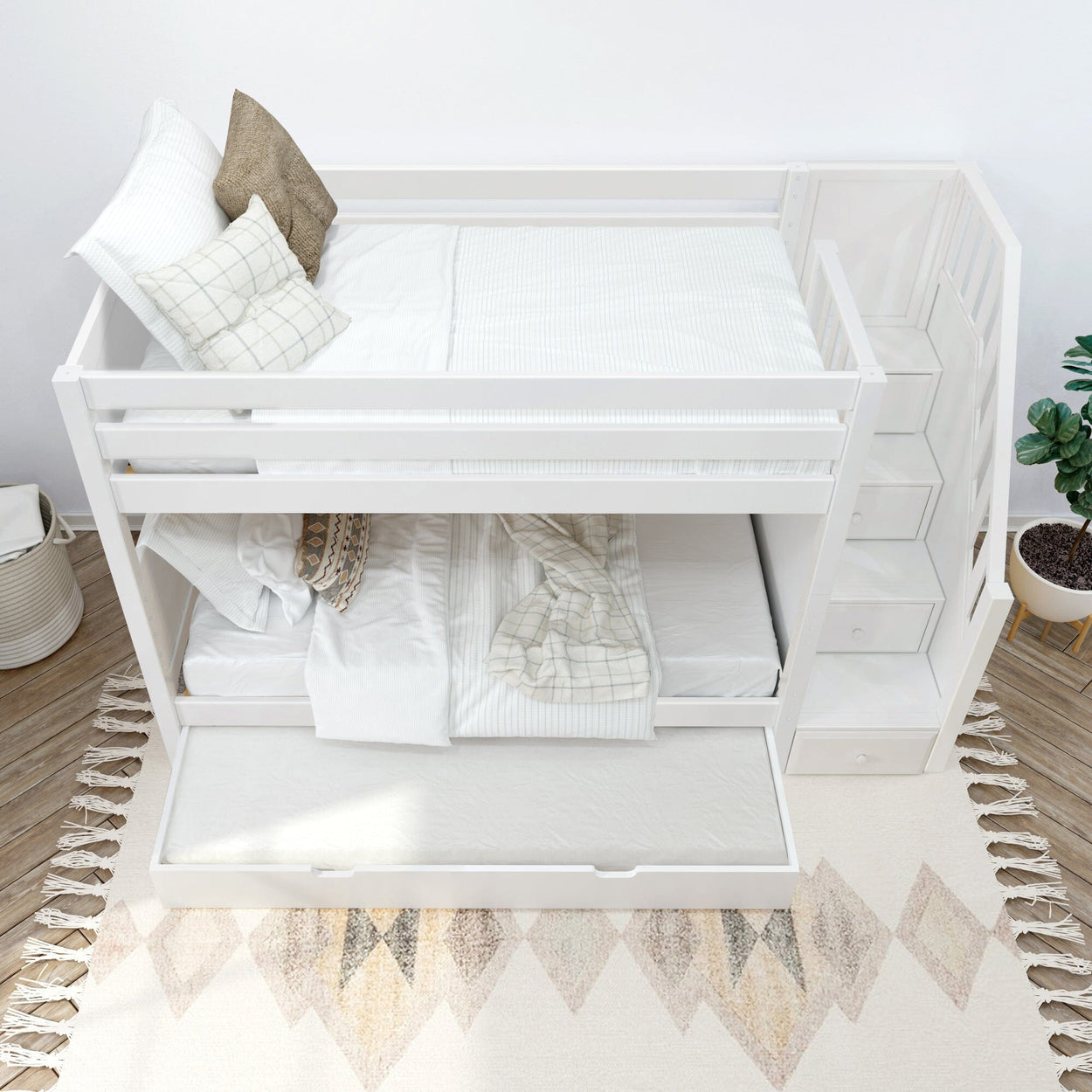 White twin bunk bed with trundle and stairs in a modern bedroom.