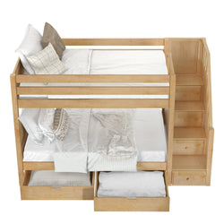 Wooden bunk bed with storage drawers and stairway, featuring white and plaid bedding for a cozy bedroom setup.