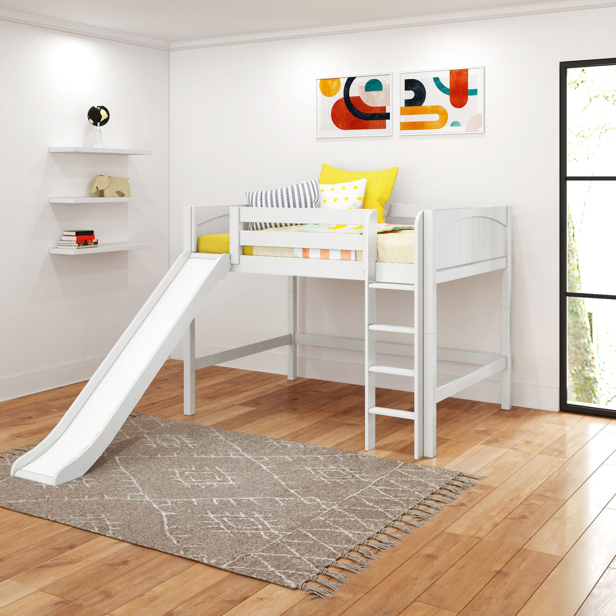 Loft bed with slide and ladder in a bright modern kids' room with wood floor and colorful decor.