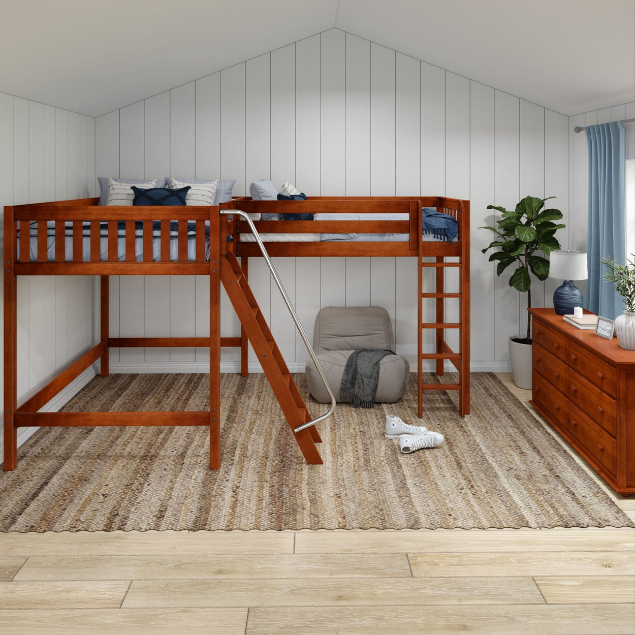 Wooden loft bed with ladder in modern bedroom, featuring a cozy chair, dresser, and decor.