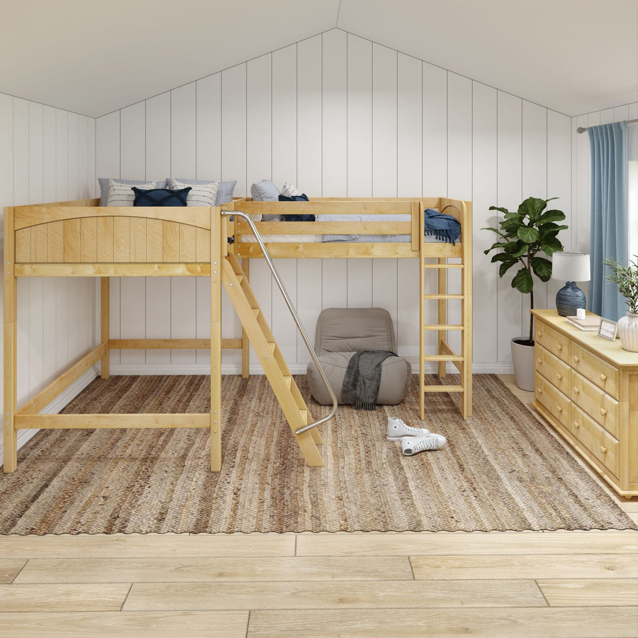 Loft bed in modern bedroom with wooden furniture and natural decor.