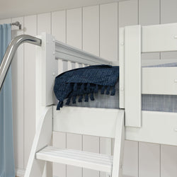 White bunk bed with a blue tassel blanket in a modern bedroom setting.