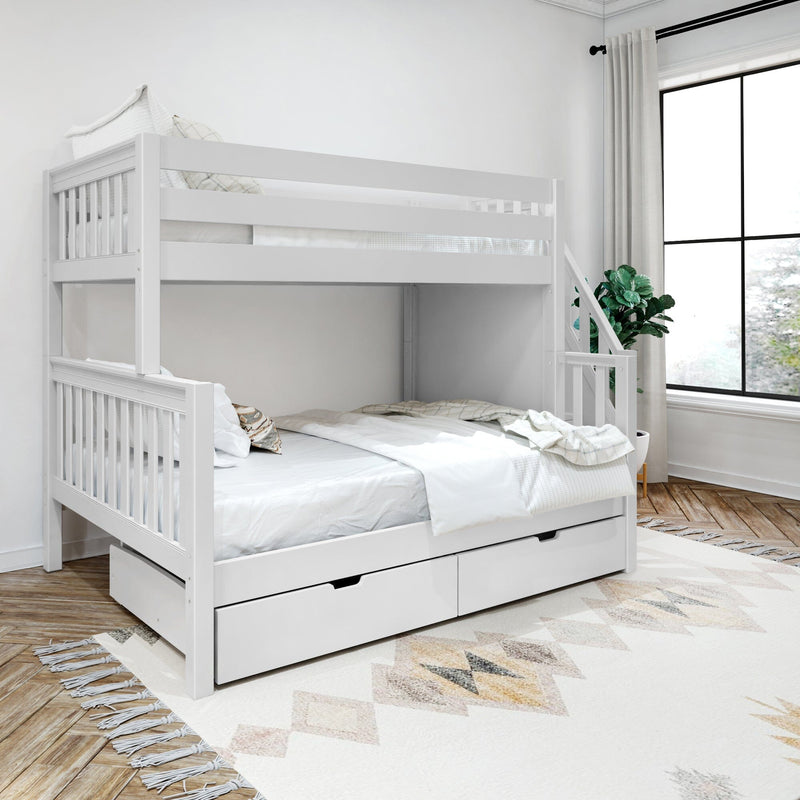 White wooden twin-over-full bunk bed with built-in stairs and under-bed storage drawers in a bright modern bedroom with hardwood floors, patterned area rug and large window