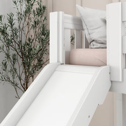 White kids' loft bed with slide and decorative pillow, perfect for modern children's bedroom design.