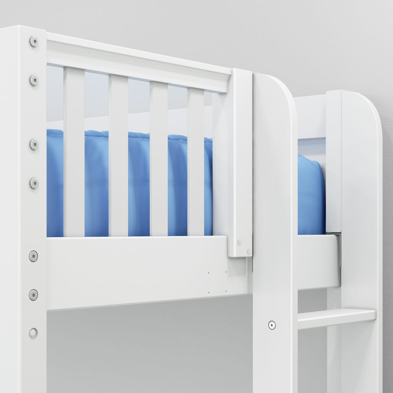 White wooden bunk bed with blue bedding and safety rail.