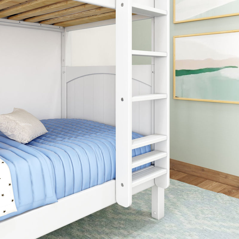 White wooden bunk bed with ladder and light blue quilted bedding in modern children's bedroom with framed abstract wall art