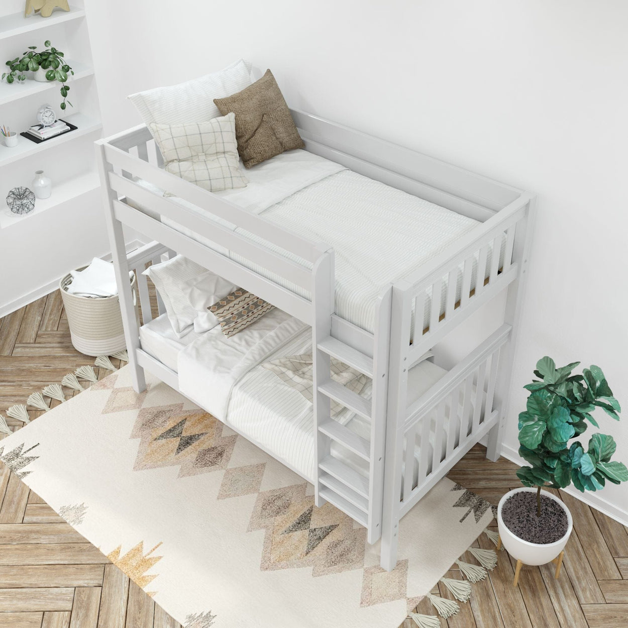 White wooden bunk bed in a modern bedroom with decorative pillows, a geometric patterned rug, and indoor plants.