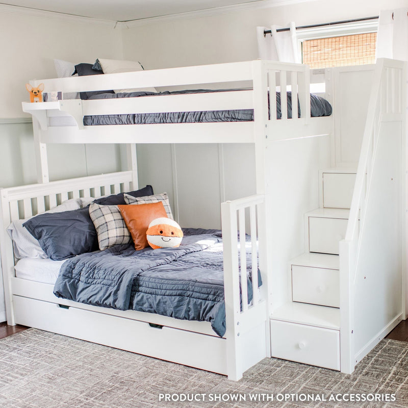 White wooden bunk bed with staircase storage and pull-out trundle, navy bedding and orange plush toy in modern kids' bedroom
