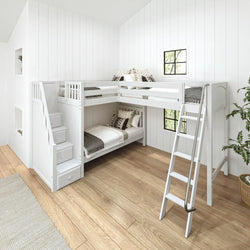 Stylish white wooden bunk bed with stairs and ladder in modern children's room featuring layered mattresses and cozy throw pillows.