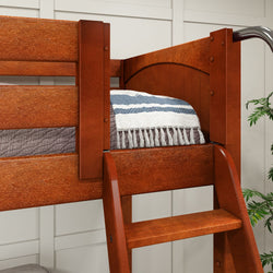 Wooden loft bed with a ladder and cozy bedding in a modern bedroom setting.
