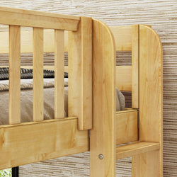 Wooden bunk bed close-up with a cozy, rustic design against a textured wall.