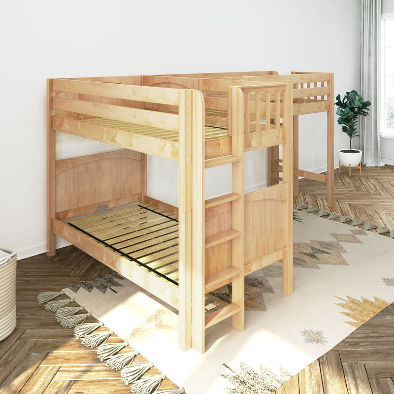 Wooden loft-style bunk bed frame with ladder and guardrails in a bright children's bedroom with potted plant and patterned rug