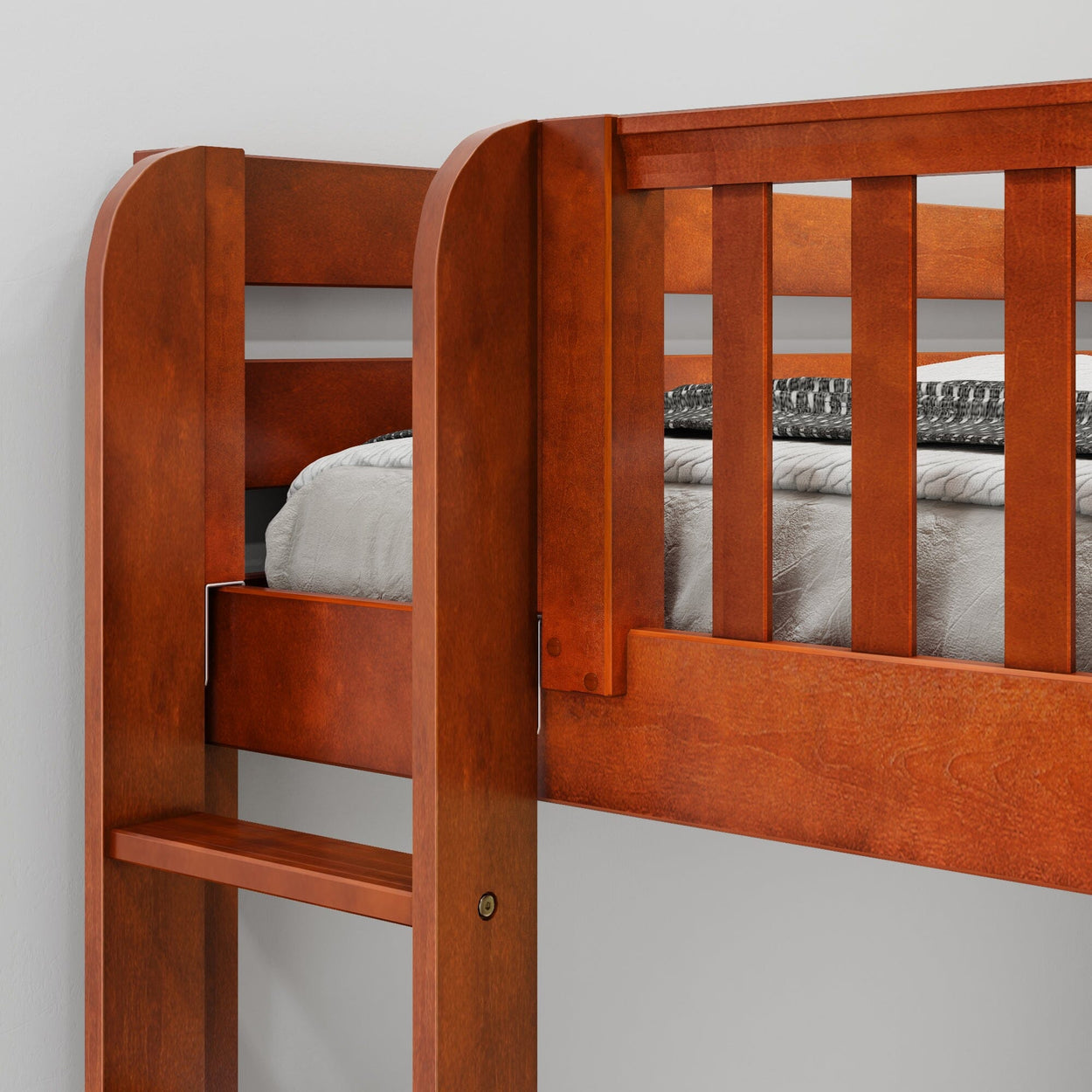Wooden bunk bed with safety rails and ladder shown in a close-up view.