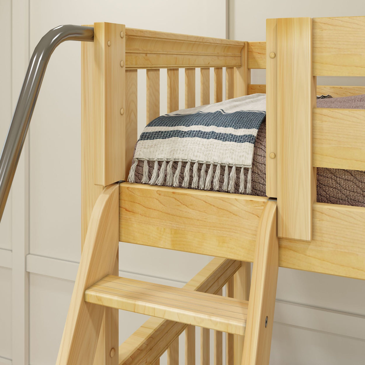Wooden bunk bed with attached ladder and striped blanket for kids' bedroom.
