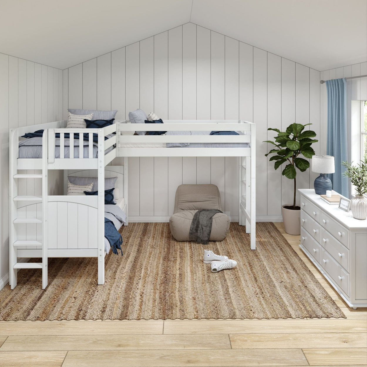 Modern kids' room with white bunk bed, cozy bean bag, and stylish dresser.
