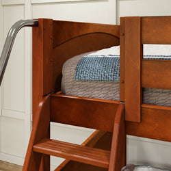 Wooden bunk bed with ladder and cozy bedding in a modern bedroom setting.