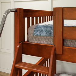 Wooden bunk bed with ladder and cozy bedding in a modern bedroom setting.